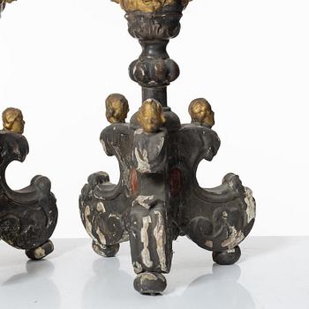 A pair of Baroque style candleholders, 19th Century.
