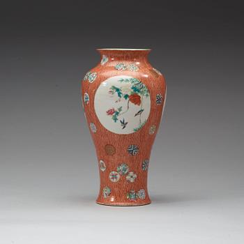 A famille rose vase , Qing dynasty, 19th century with Qianlong sealmark in red.