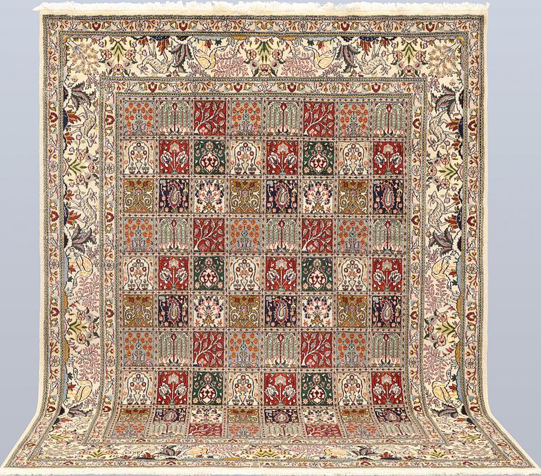 A part silk Moud rug, approx. 250 x 199 cm.