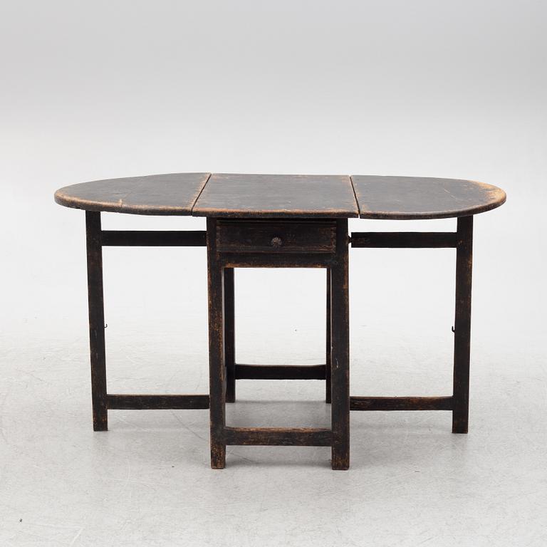 A Swedish wooden table, 19th century.