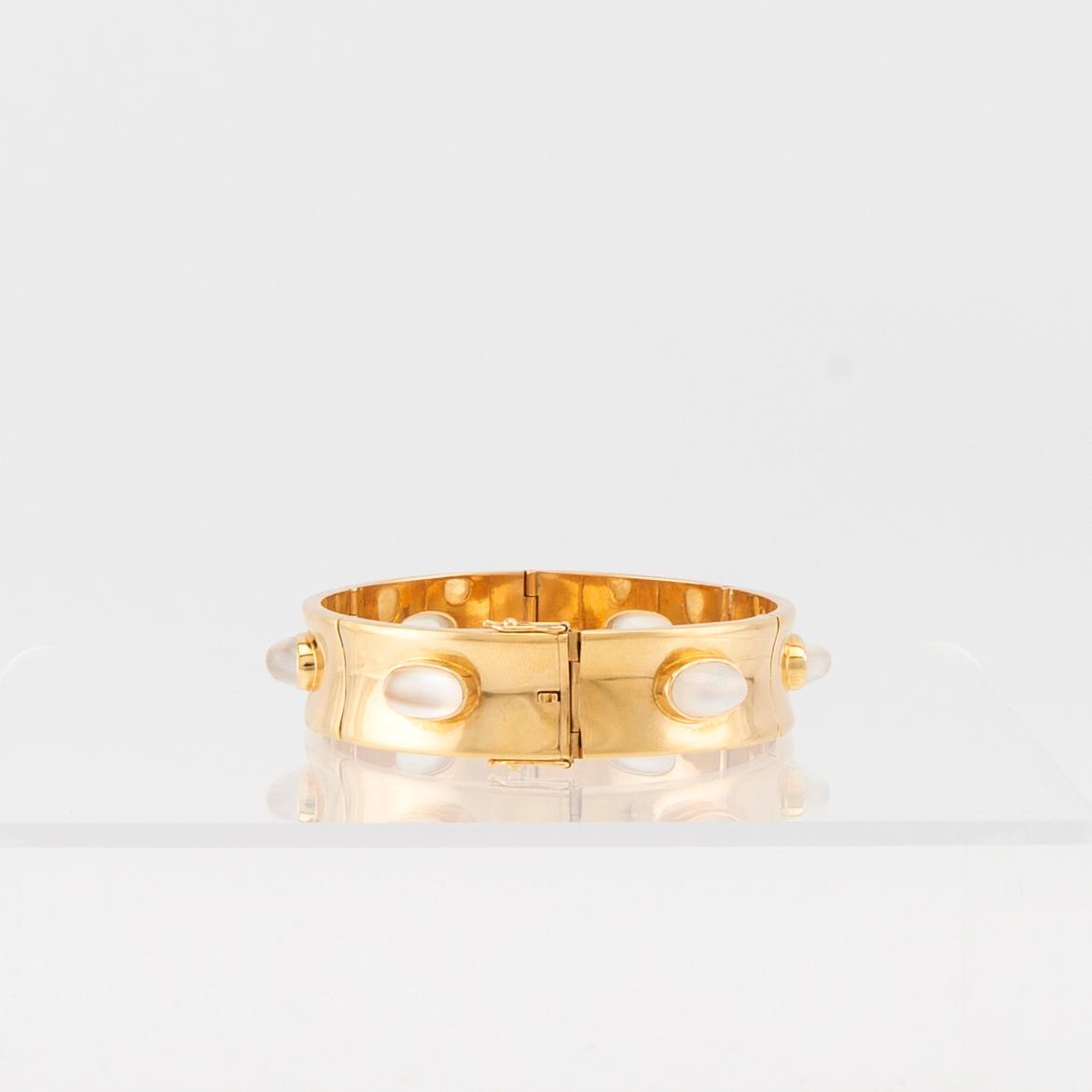 Armband 18K guld samt cabochonslipade månstenar Olle Torrestad Halmstad 1962.