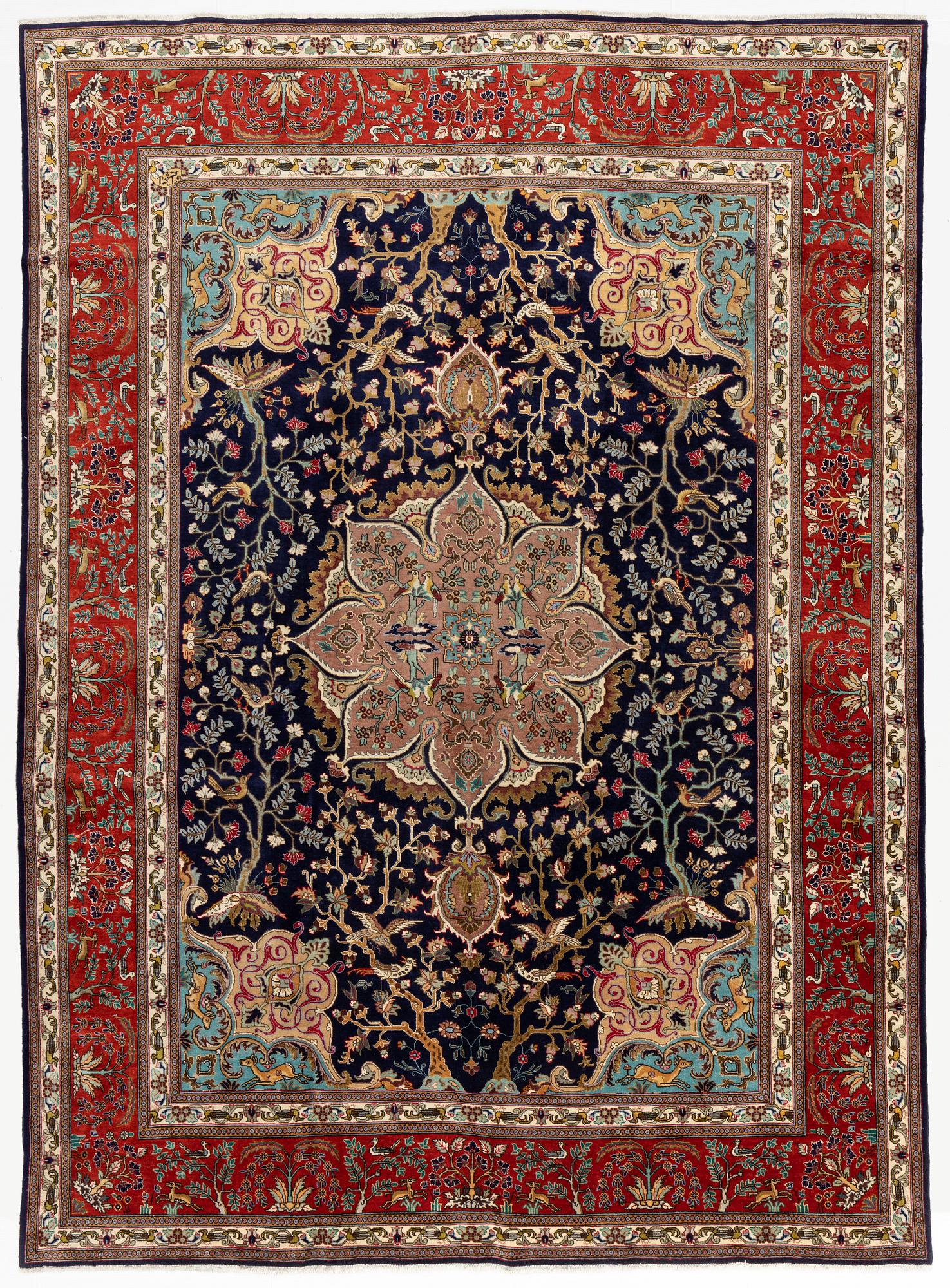 A carpet, Tabriz, signed Ipchilar, ca 385 x 280 cm.
