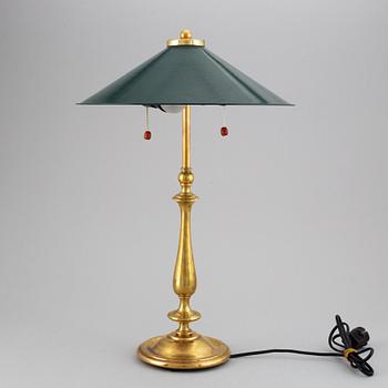 A brass table light, first half of the 20th Century.