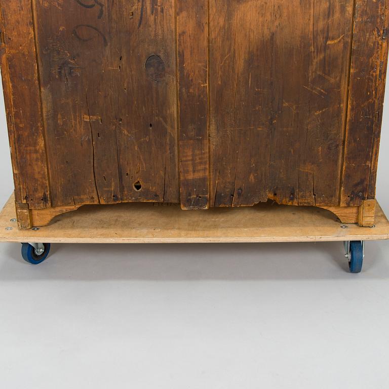 A bureau veneered in Karelian birch, mid-19th century.