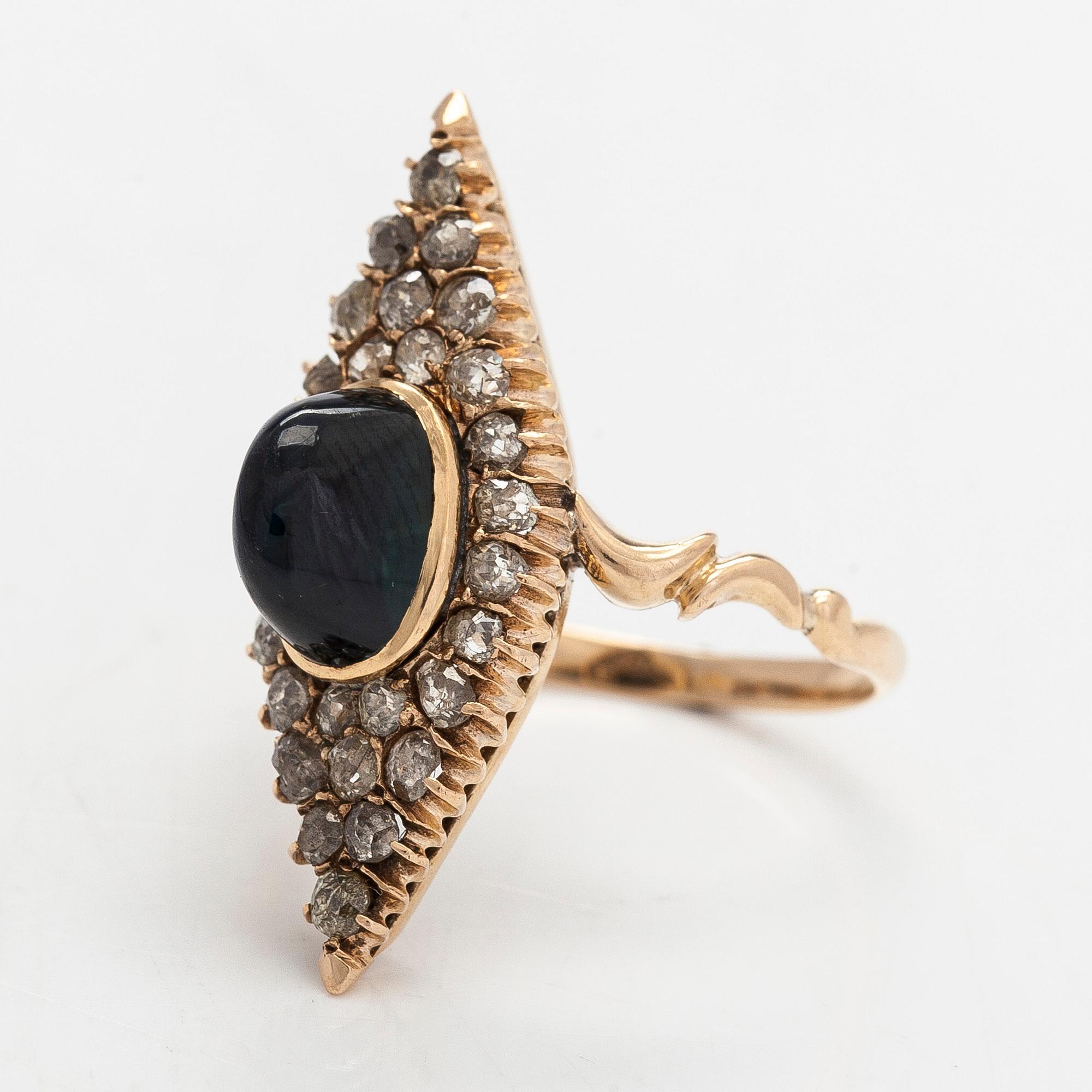 Ring in 14K gold, old-cut diamonds and a sapphire, cyrillic assay mark AP, Russia, around year 1900.