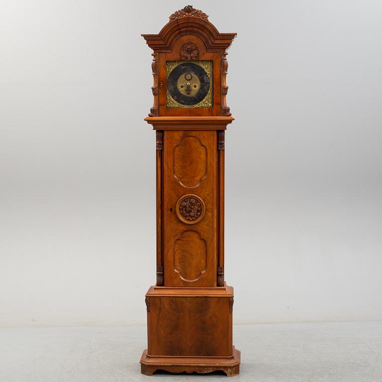 A 18th century long case clock.