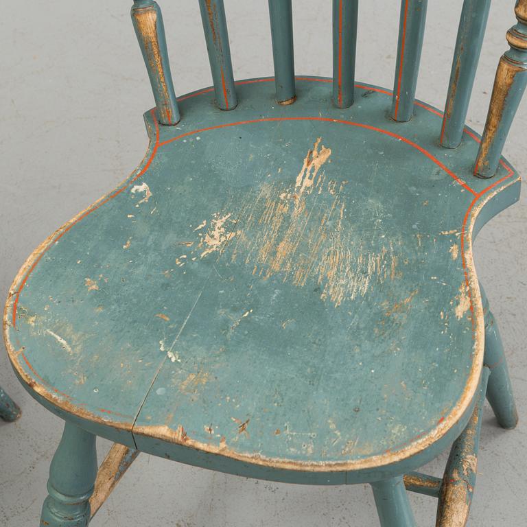 A pair of late 19th century painted chairs.