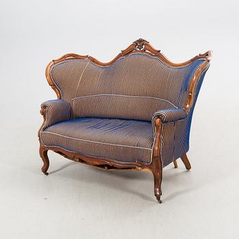 A Neo Rococo mahogany sofa later part of the 19th century.