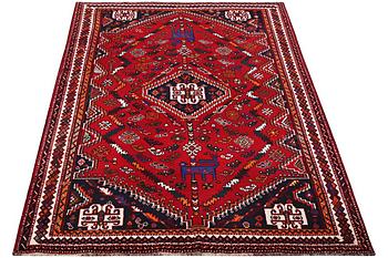 A Kashgai carpet, a. 252 x 162 cm.