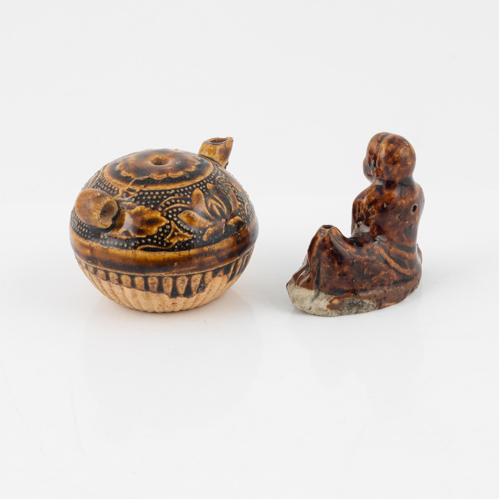 A brown glazed water dropper and a brush rest, Qing dynasty, 19th Century.