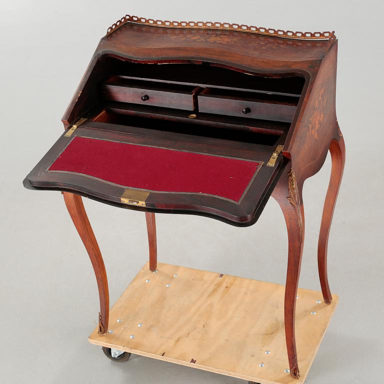 A Louis XV-style writers desk from the mid 20th century.