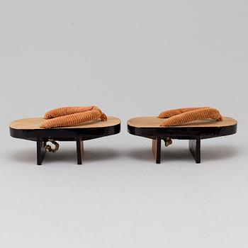 A pair of Japanese 'Geta' shows and two Chinese pouches, early 20th century.