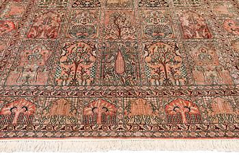 A silk Kashmir carpet, approximately 302 x 221 cm.