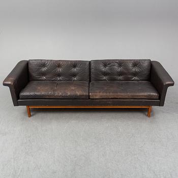 A black leather 1960s-70s sofa by Karl Erik Ekselius.