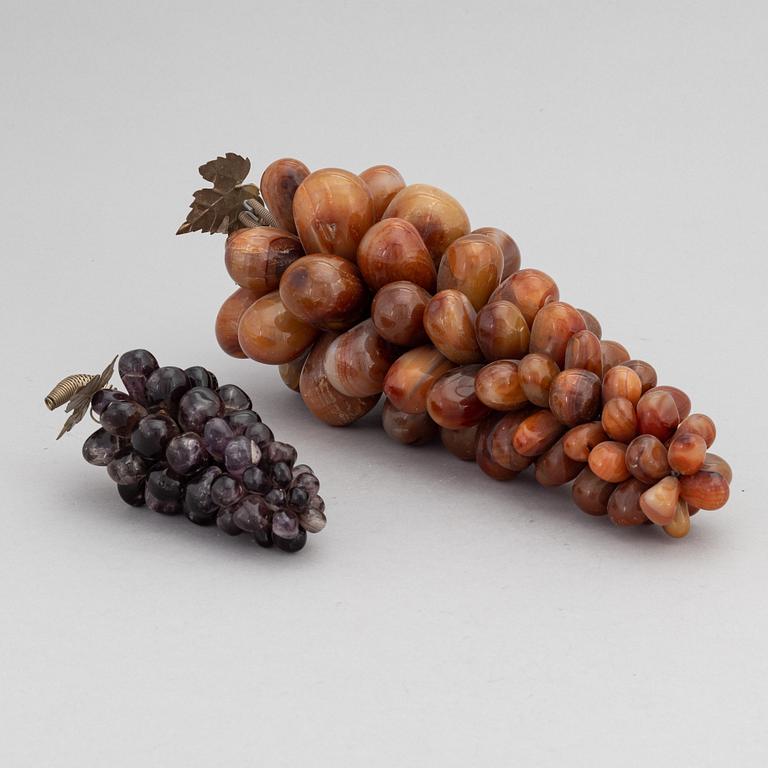 Two agate and quartz grape decorations.