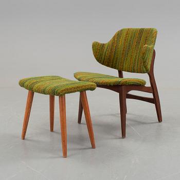 An IKEA armchair with a stool.