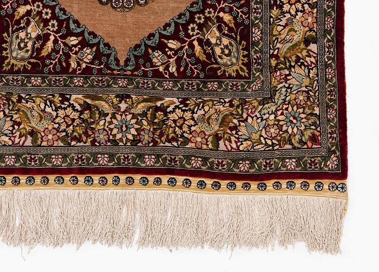 A semi-antique Hereke souf, silk and metal thread rug, West Anatolia, c. 121 x 75 cm.