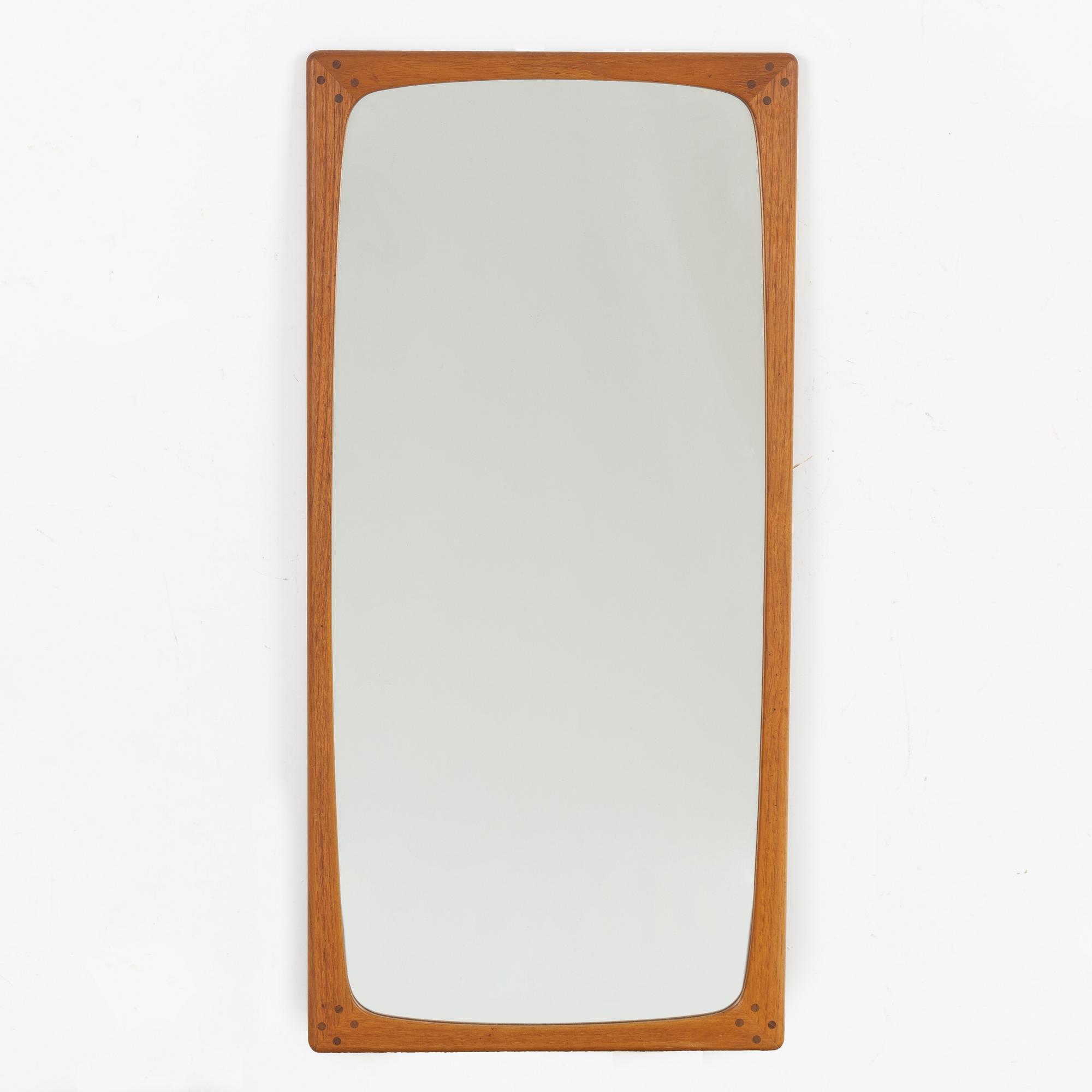 A dresser with mirror, Denmark. 1960s.