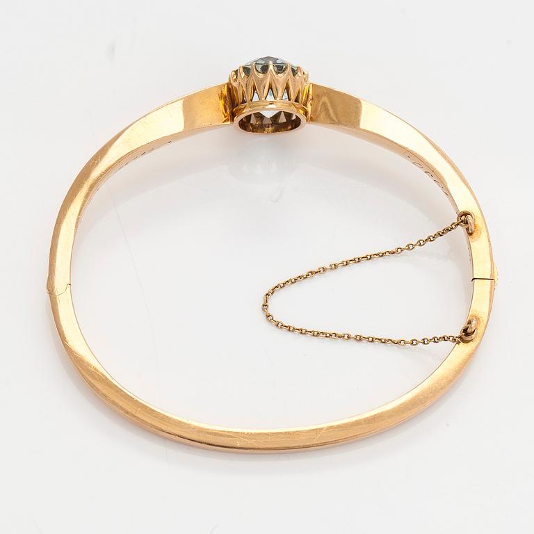 Rannerengas, viistehiottu akvamariini, 18K kultaa, Samuel Mika Westerlund, Porvoo 1927.