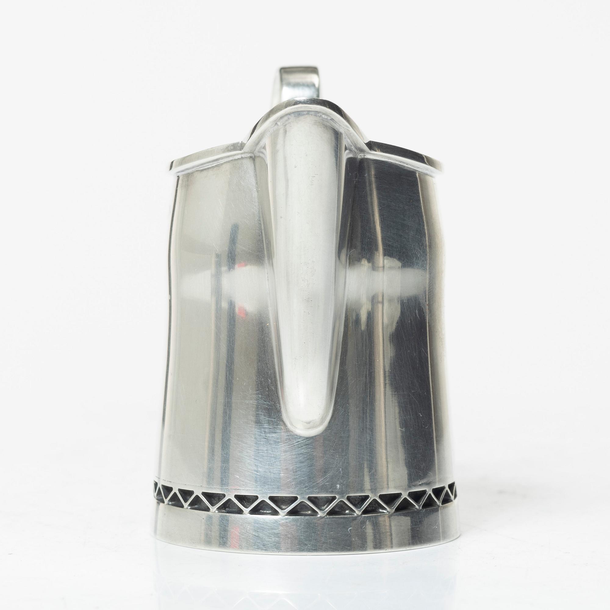 A three-piece silver coffee service by Helge Lindgren for K. Andersson, Stockholm, 1958.