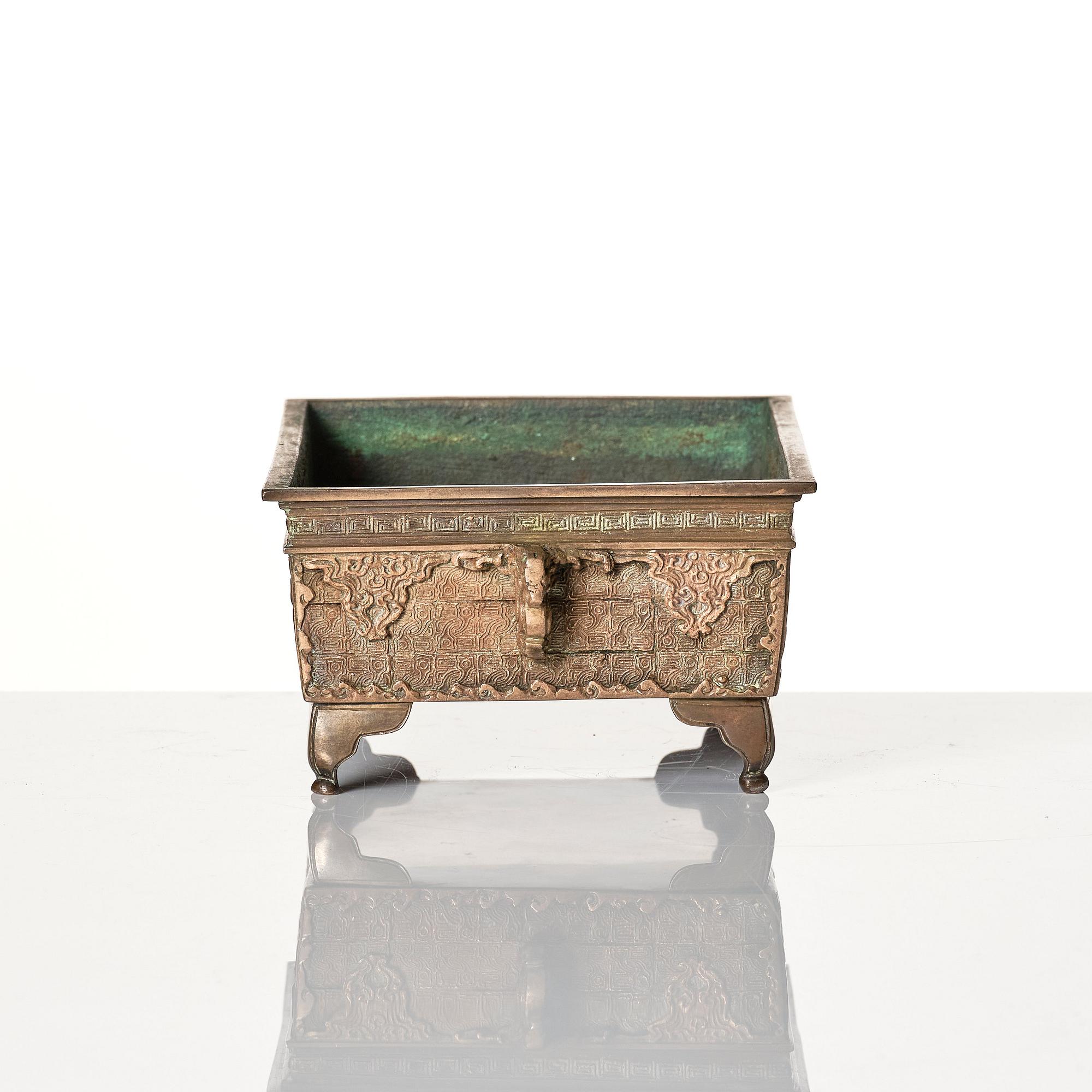 A bronze with silver appliqué censer/flowerpot, 19th Century.