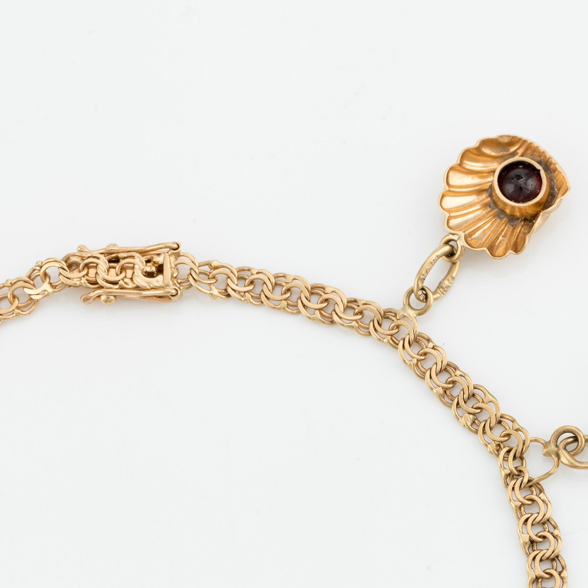 Armband, 18K guld, med berlocker.