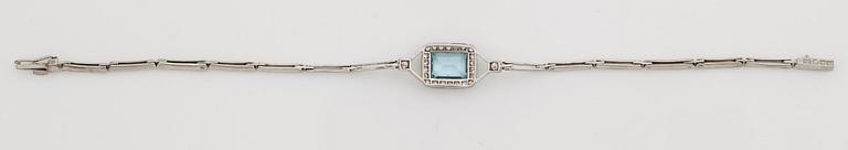 A step-cut aquamarine, old and single cut diamond bracelet.