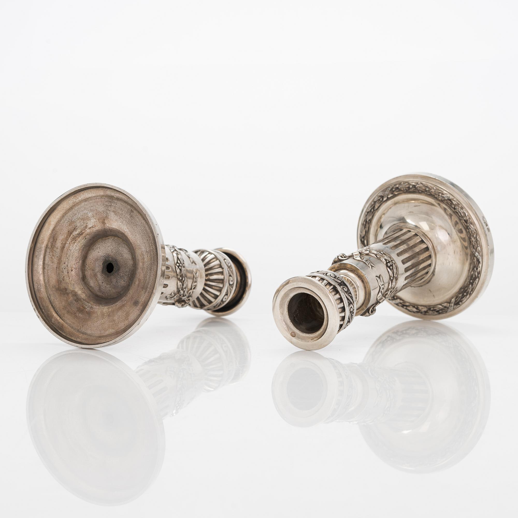 A pair of Saglier Frères silver plated Louis XVI-style candlesticks from around year 1900.