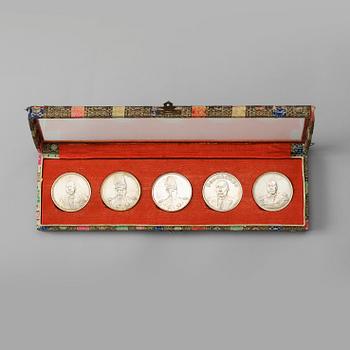 1347. A box with five silver coins, Republic, early 20th Century.