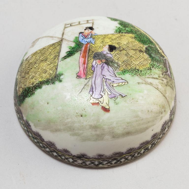 Two Chinese famille rose hat stands and a jar with cover, 20th century.