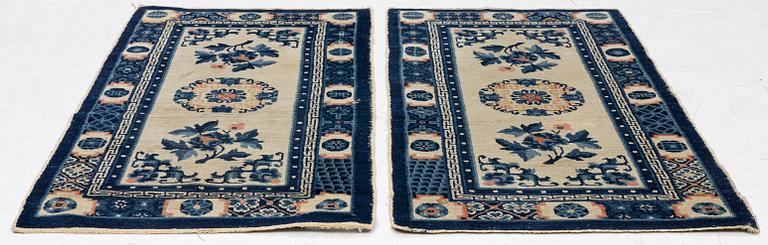 A pair of Baotou rugs, China, c. 120 x 64 cm.