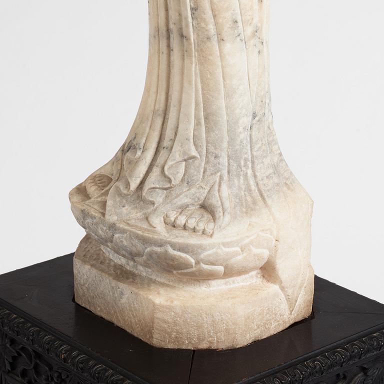 A white stone scultpure of Guanyin, China, presumably early 20th Century.