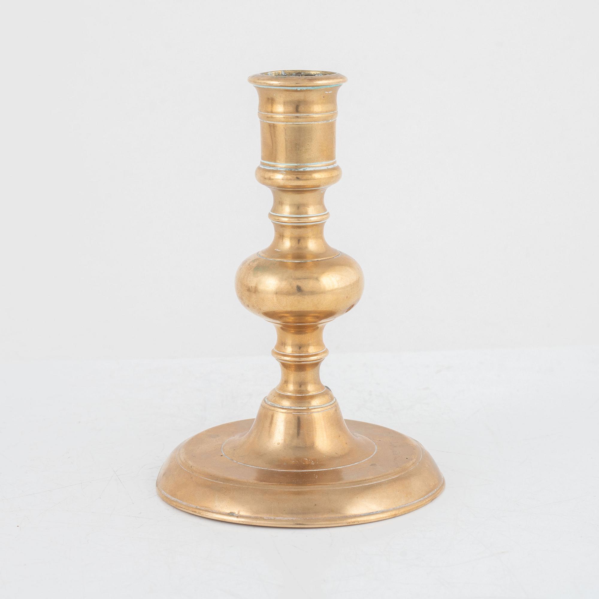 A Baroque brass candlestick, 17th century.