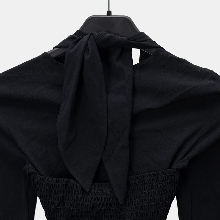 Chanel, A black silk top, size 34.
