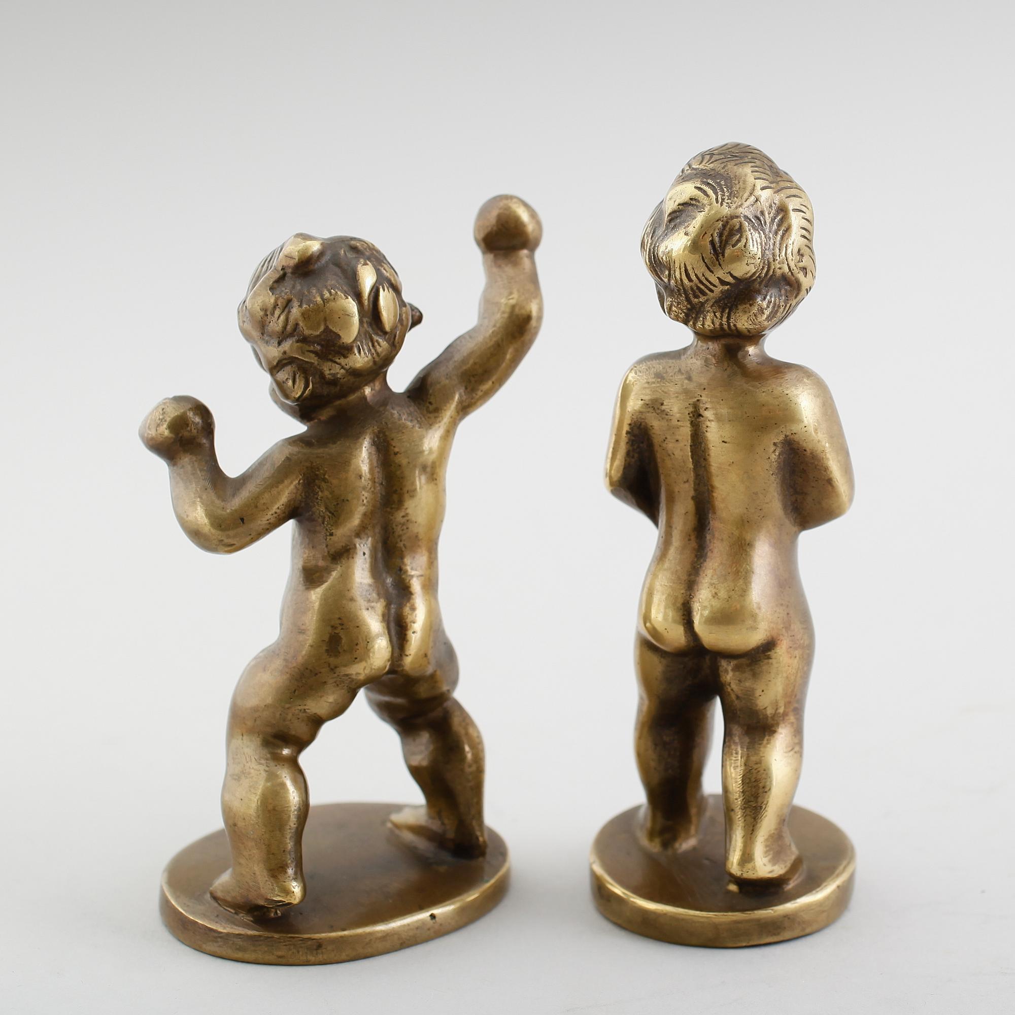 FIGURER, 2 st, brons, monogramsignerade MM, Danmark, 1900-talets första hälft.