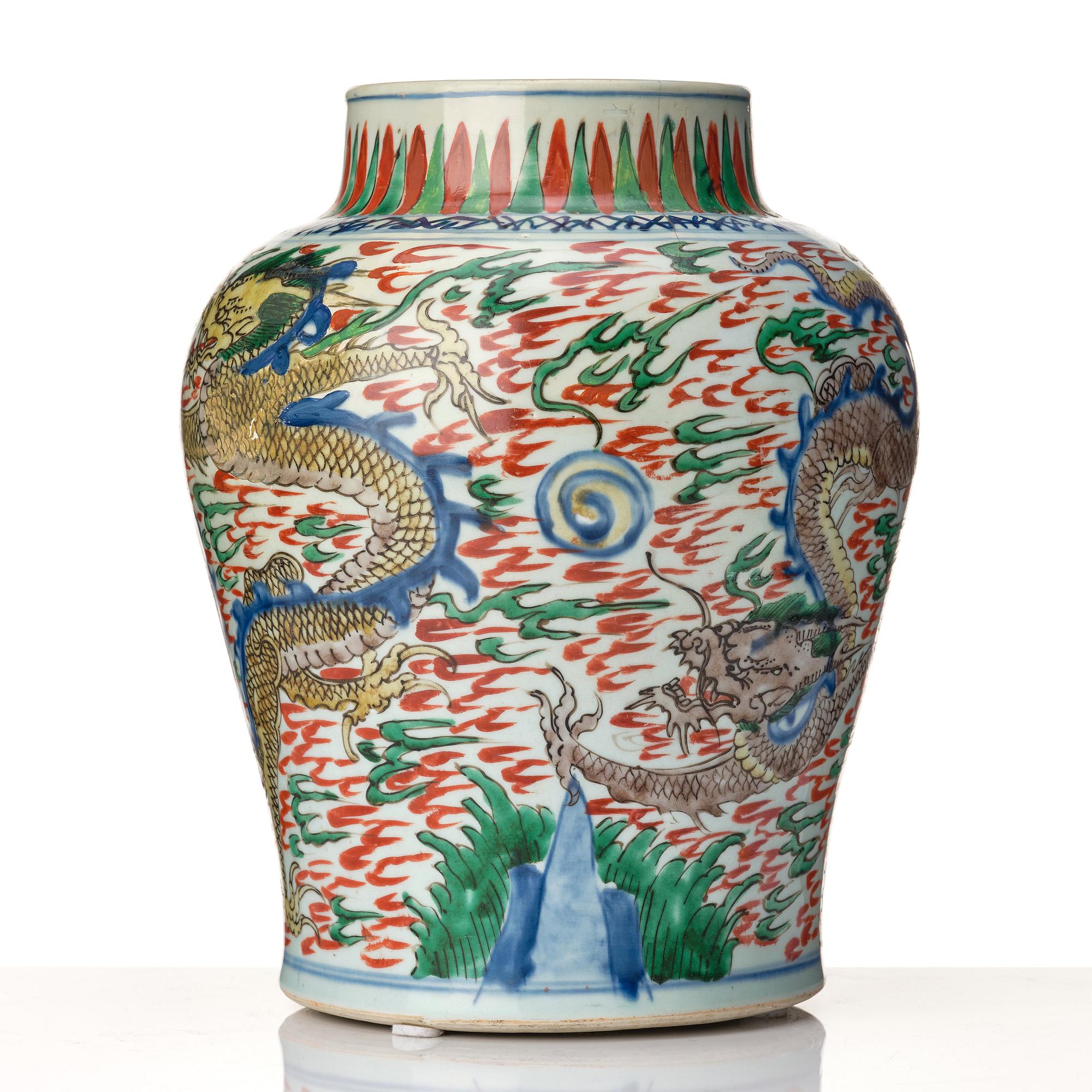 A matched pair of Transitional Wucai jars, 17th Century.