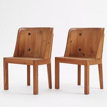 Axel Einar Hjorth, a pair of stained pine "Lovö" armchairs, Nordiska Kompaniet,  Sweden, 1930s.