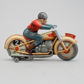 A Technofix tinplate Trick motorcycle, Germany, ca 1950.