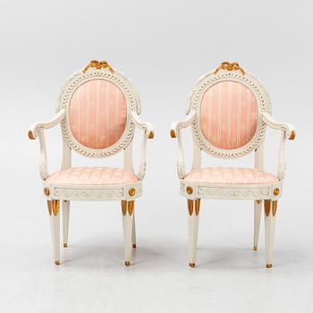 A pair of Gustavian armchiars, 19th century.