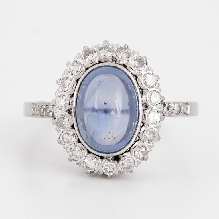 Cabochon-cut sapphire and eight-cut diamond ring.