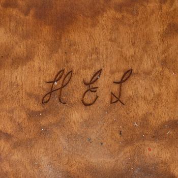 Mjölkstäva (Nápphi), signerad HEL.