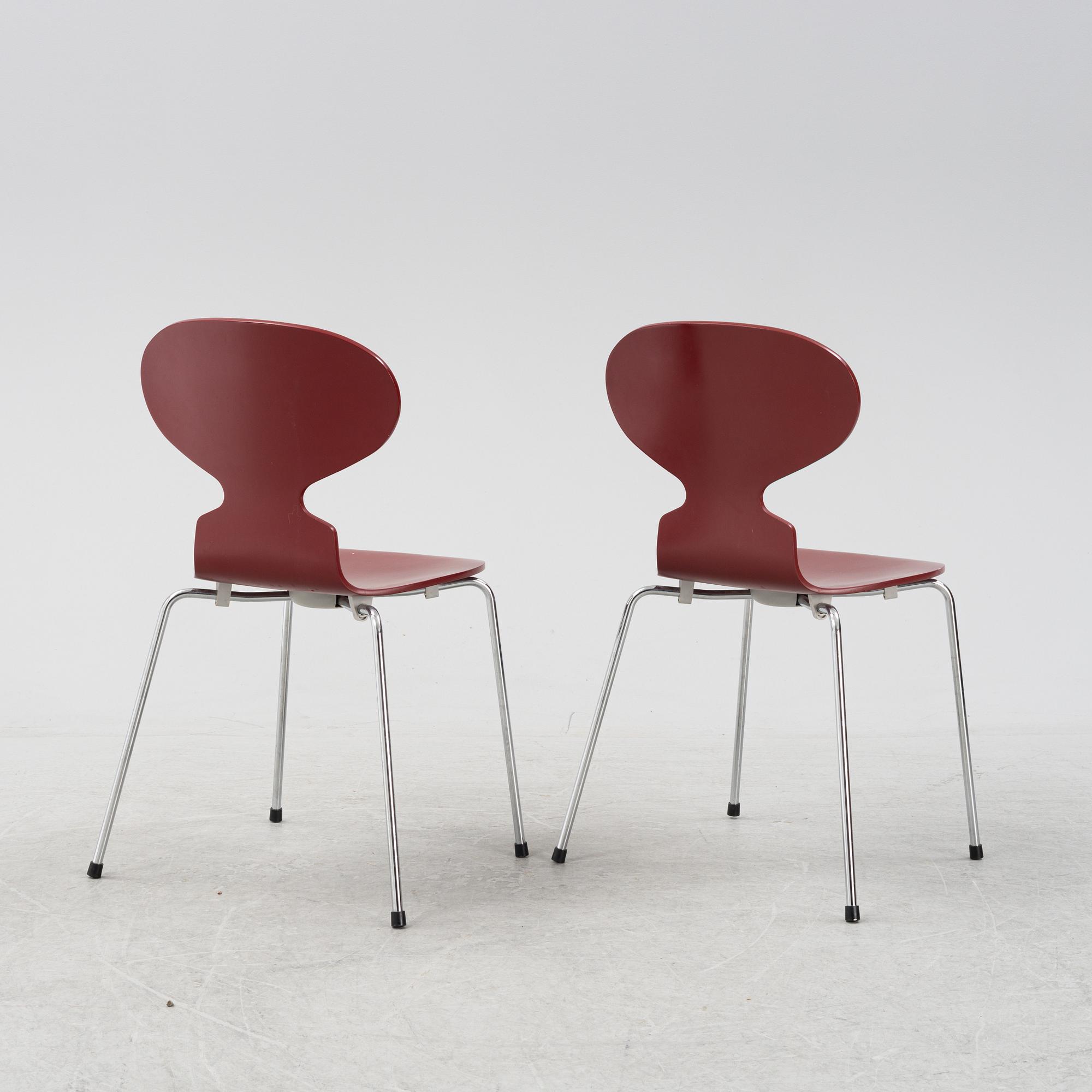 Arne Jacobsen, two 'The Ant' chairs, Frits Hansen, Denmark, 2003.