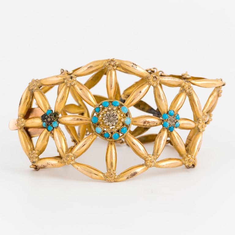 Armband 14K samt låghaltigt guld med turkosa stenar.