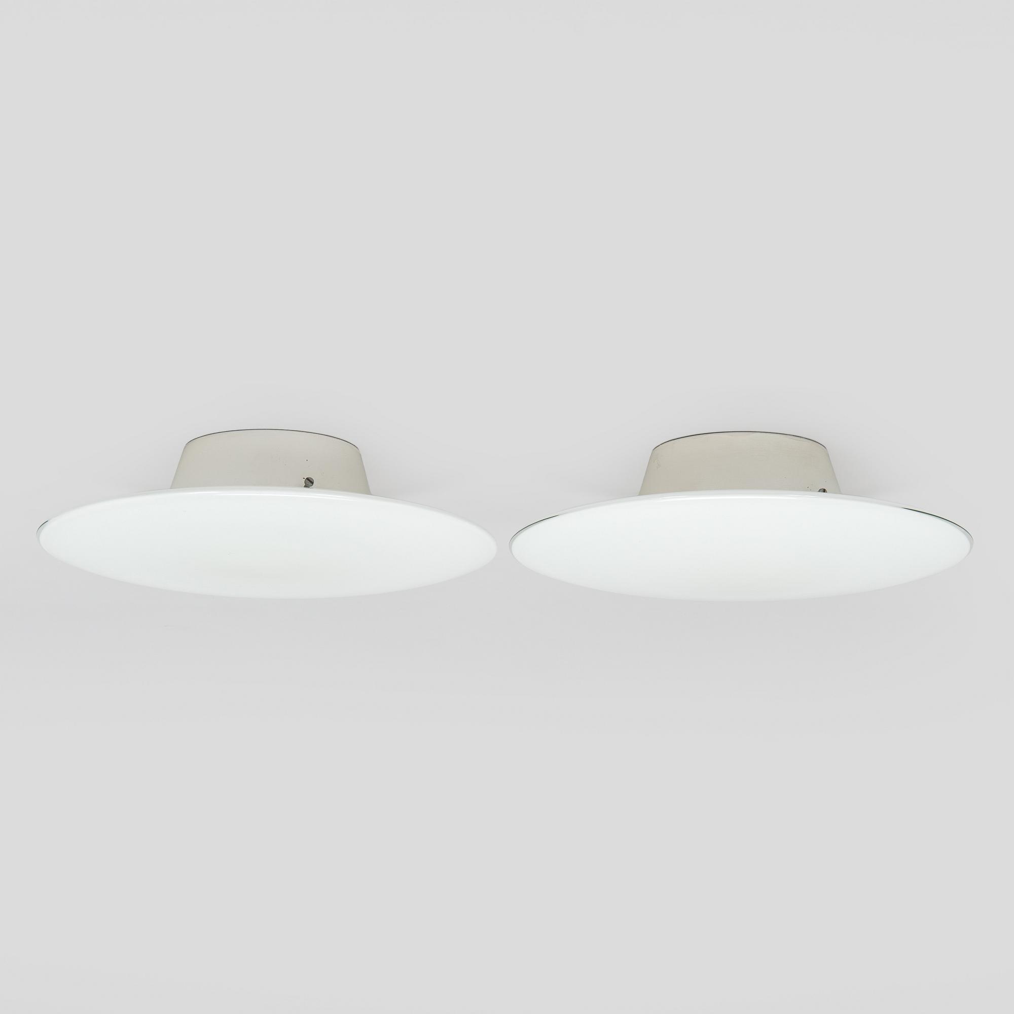 Arne Jacobsen, a pair of 1960's 'AJ-Eklipta' ceiling / wall lamps, for Louis Poulsen/licensed manufacturer Orno, Stockmann.