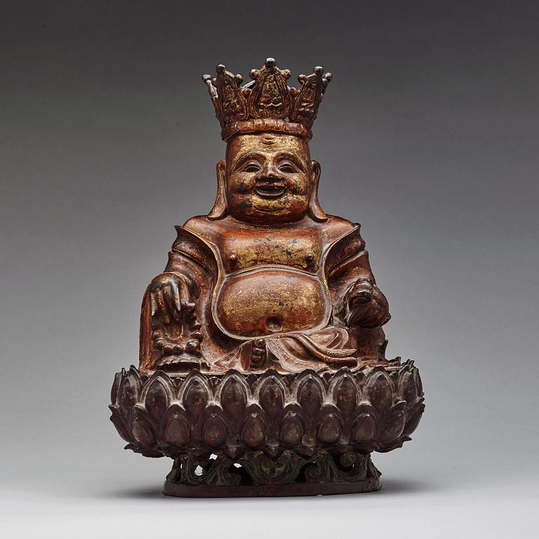 A large seated bronze figure of budhai, Ming dynasty (1368-1644).