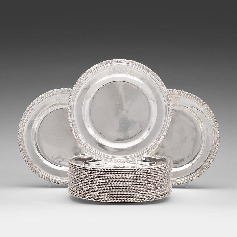 A set of 24 English mid 18th century silver plates, mark of George Methuen, London 1756.