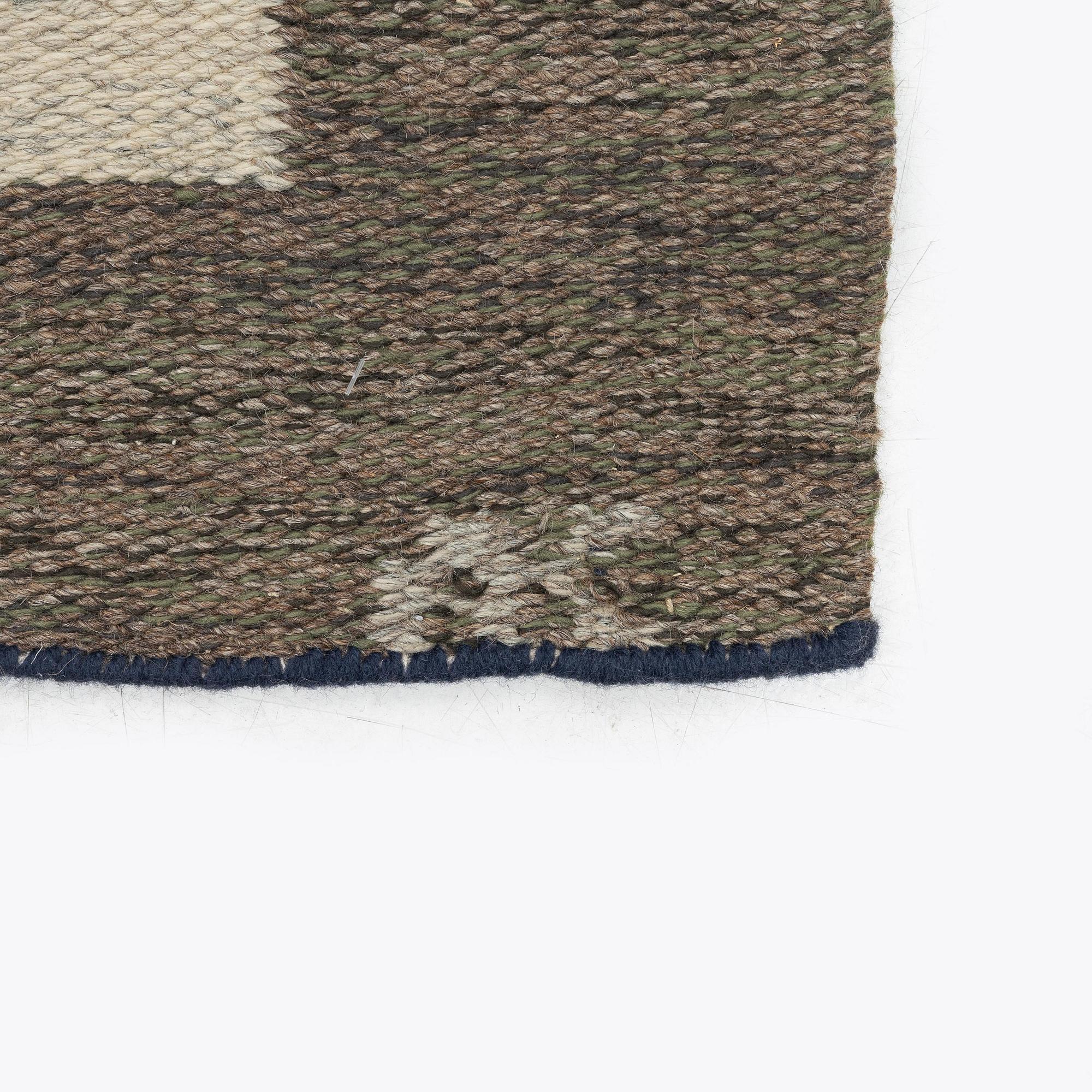 Aina Kånge, a carpet, flat weave, c. 301 x 198 cm, signed AK.