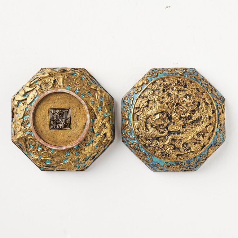 A bronze imitating seal paste box with cover, Qing dynasty, with Qianlong mark.