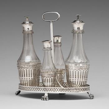 146. A Swedish early 19th century silver and glass cruet-set, marked Pehr Zethelius, Stockholm 1808.