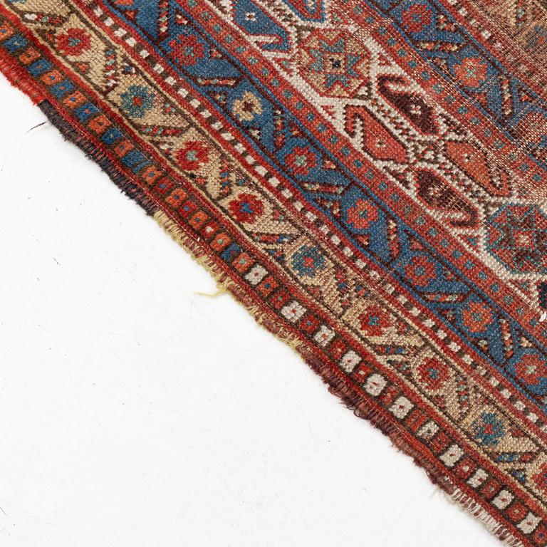 An antique Khamseh carpet, South western Iran, c 352 x 178 cm.
